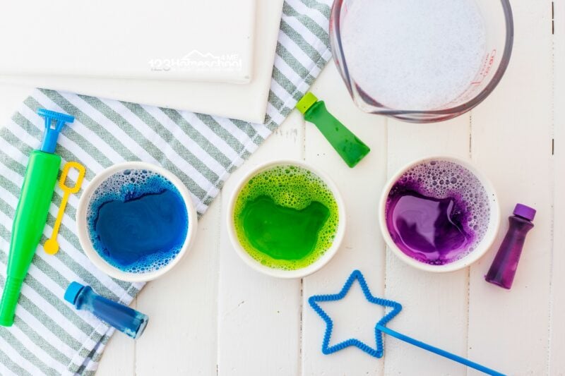 use food coloring mixed with bubble solution to make colored bubbles for your paint
