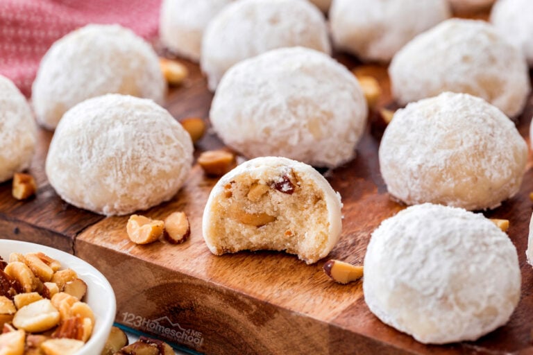 Mexican Wedding Cake Cookies are on of my favorite christmas cookie recipes! These snowballs are a buttery cookie covered in powdered sugar.