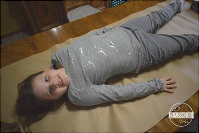 kids will trace their bodies on butcher paper to make their own my body project